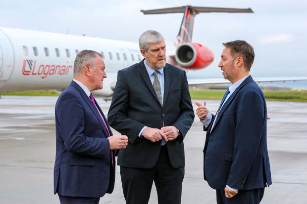 Economy Minister Conor Murphy pictured at City of Derry Airport with its Manager Steve Frazer and Infrastructure Minister John O’Dowd
