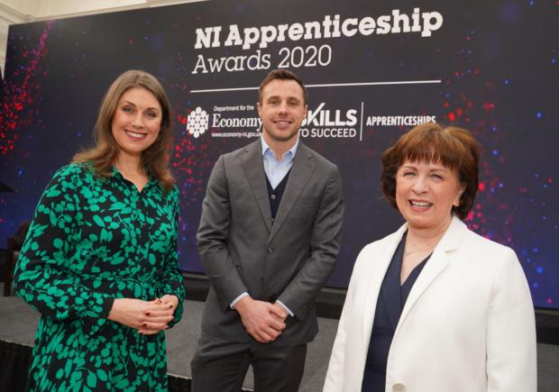 Pictured at #NIAW2020 NI Apprenticeship Awards in Belfast are event compere Sarah Travers, rugby star Tommy Bowe and Economy Minister Diane Dodds