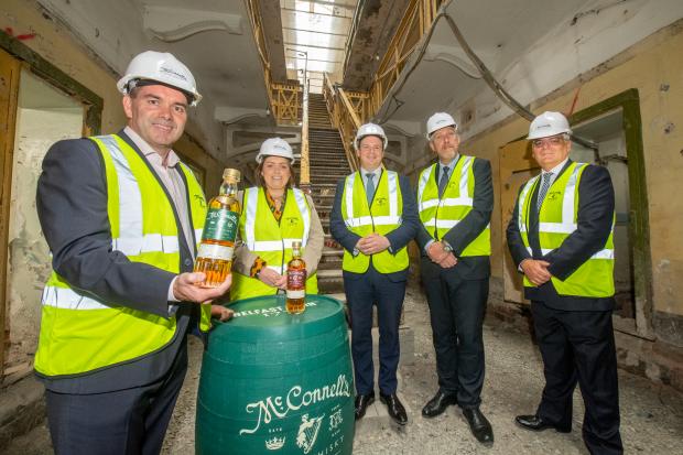 John Kelly, CEO, Belfast Distillery Company; Communities Minister Dierdre Hargey; Economy Minister Gordon Lyons; Infrastructure Minister John O'Dowd; and Mel Chittock, Interim CEO of Invest NI.