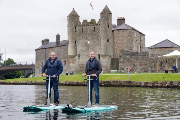 •	Peter Bradshaw, Erne Adventures, and Economy Minister Gordon Lyons try out the new eBoards on Lough Erne. The electric powered water scooters are the first of their kind in the UK and Republic of Ireland.