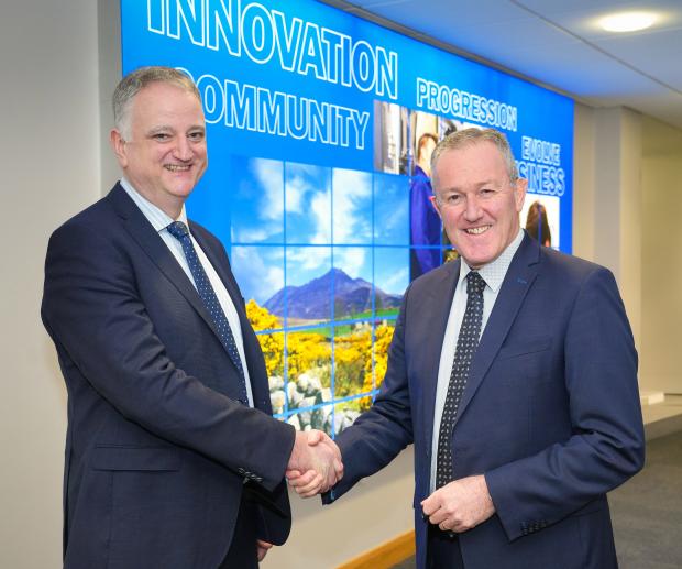 1.	Economy Minister Conor Murphy pictured with the new Chair of Invest NI John Healy OBE.