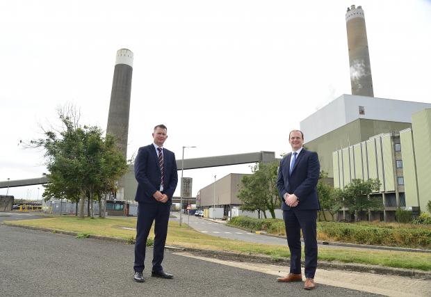 Economy Minister Gordon Lyons at Kilroot Power Station with Ian Luney, Commercial Director of EP UK Investments.