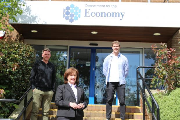 Economy Minister Diane Dodds met with Gareth Quinn (L) and Andrew Trimble (R) from Kairos Sports Tech Ltd 