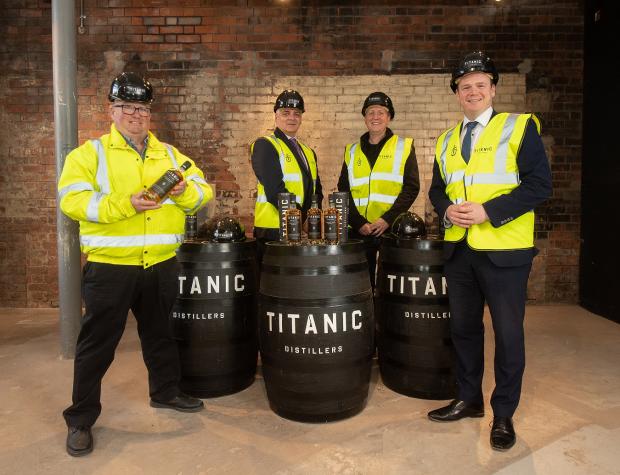 Titanic Distillers Directors Peter Lavery and Richard Irwin with Invest NI Interim CEO Mel Chittock and Economy Minister Gordon Lyons  