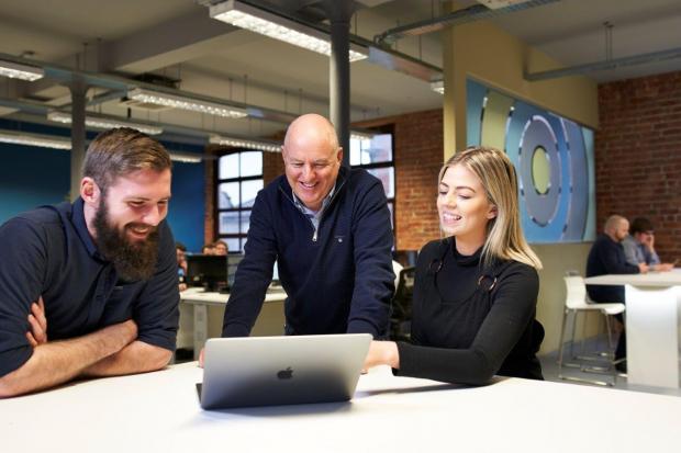 John Harkin (middle), Founder and Director of Alchemy Technology Services, with successful recruits from the company’s first Academy, Technical Analyst Jordan Cairns and PMO Analyst Olivia Skuce
