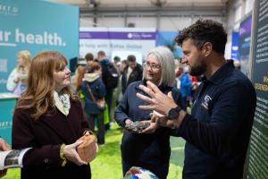 Economy Minister Dr Caoimhe Archibald is pictured at the GeoEnergy Discovery Centre at this year’s Balmoral Show.  She is pictured with Sharon Clements from the Department for the Economy and Paul Wilson from Geological Survey of Northern Ireland.