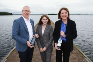 Image of 3 people standing - Pictured (L-R) Joe McGirr, founder and CEO of The Boatyard Distillery, Economy Minister Dr Caoimhe Archibald and Ethna McNamee, Head of Regional Business for the Western region at Invest Northern Ireland.