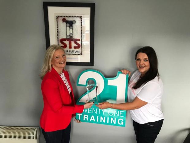 Heather Cole (l, DfE) with Debbie Deans of 21 Training (formerly Strabane Training Services) finalists in SME Award in partnership with Specialist Joinery Group