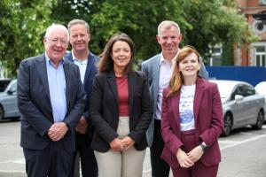 Rory McShane, Chairperson, Newry BID (Business Improvement District), Gary Quinn, Director of Rivers Operations, Department for Infrastructure, Infrastructure Minister Liz Kimmins, Economy Minister Dr Caoimhe Archibald, and Eamonn Connolly, Newry BID Manager.